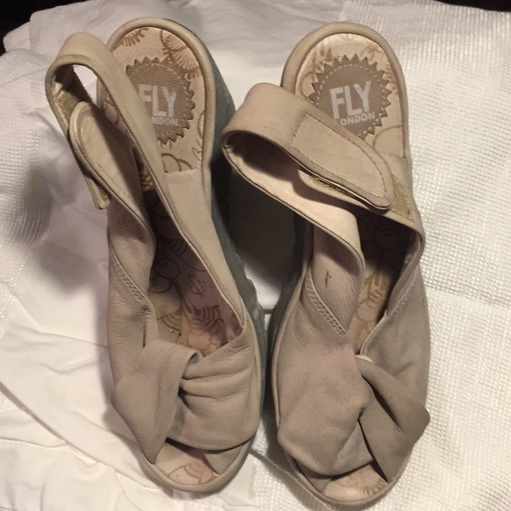 Leather butter soft sling back wedge. tan colored